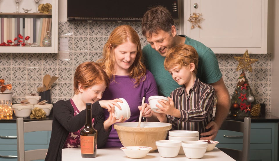 The Figgy's family making a Christmas pudding