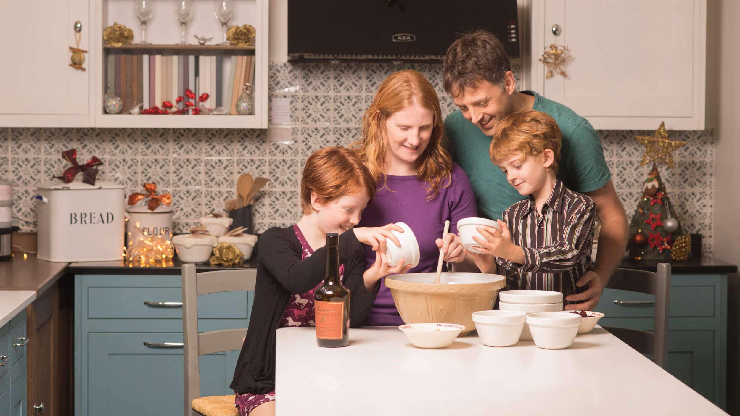 The Figgy's family making a Christmas pudding