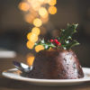 Figgy's luxury Xmas Pudding on a plate with holly