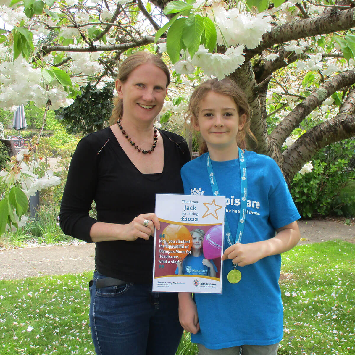 Jack and Jo with medal and certificate from Hospiscare